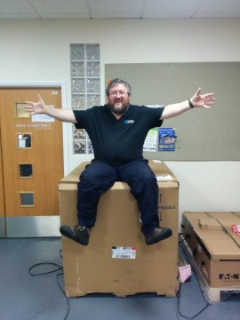Andy sits on the Eaton UPS!