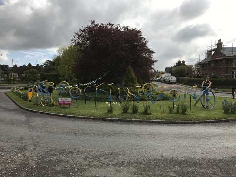 Roundabout decorated in Pocklington, The word Pocklington made out of bicycles!